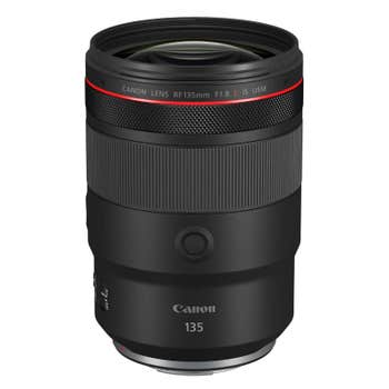 Canon RF 135mm f/1.8 L IS USM telephoto prime lens standing upright, front glass and red ring visible