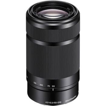 Sony E 55-210mm f/4.5-6.3 OSS telephoto zoom lens standing upright, showing zoom markings and focus rings