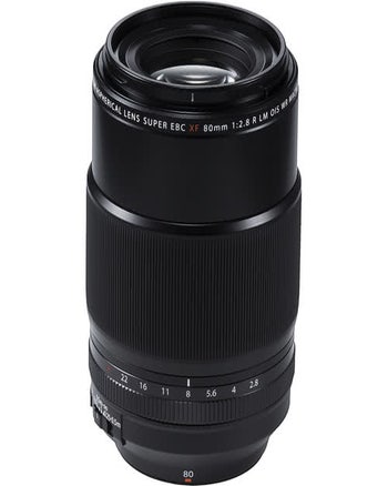 Fujifilm XF 80mm f/2.8 R LM OIS WR macro lens standing upright, showing front glass and aperture ring