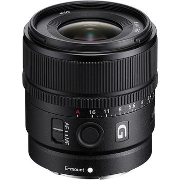Sony E 15mm f/1.4 G APS-C prime lens with aperture ring and AF/MF switch, front angled view