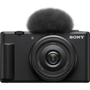 Front view of Sony ZV-1F black vlogging camera with 20mm lens and top windscreen attached