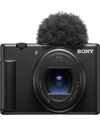 Front view of Sony ZV-1 II digital compact vlogging camera in black with attached furry windscreen.