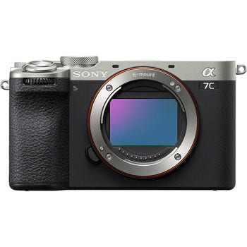 Front view of Sony A7C II silver mirrorless full frame camera body with exposed sensor