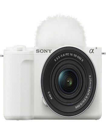 Front view of white Sony ZV-E10 Mark II with 16-50mm PZ OSS II lens and top windscreen attached.