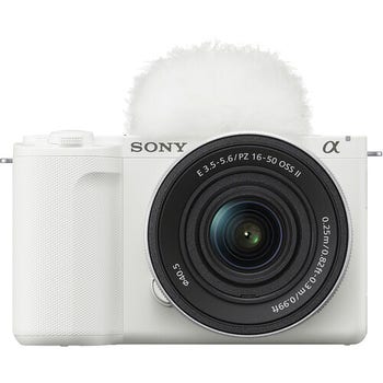 Front view of white Sony ZV-E10 Mark II with 16-50mm PZ OSS II lens and top windscreen attached.