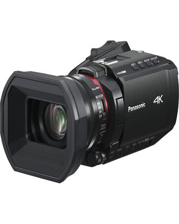 Panasonic HC-X1200 4K HDMI camcorder angled view showing wide lens hood and compact body