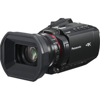 Panasonic HC-X1200 4K HDMI camcorder angled view showing wide lens hood and compact body