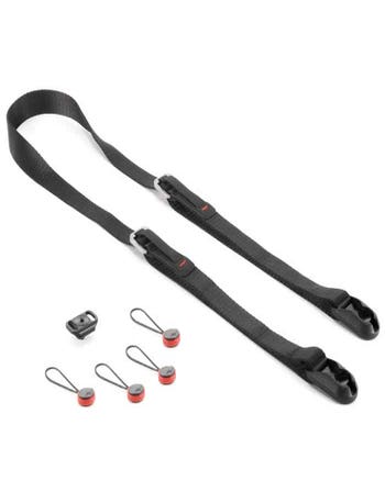 Peak Design Leash black camera strap laid out with four anchor links and mounting plate