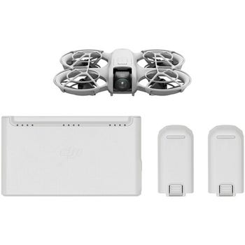 DJI Neo Fly More Combo with drone, two extra batteries and charging hub laid out on white