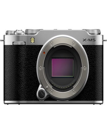 Front view of Fujifilm X-M5 mirrorless camera body in silver and black, showing APS-C sensor and lens mount.