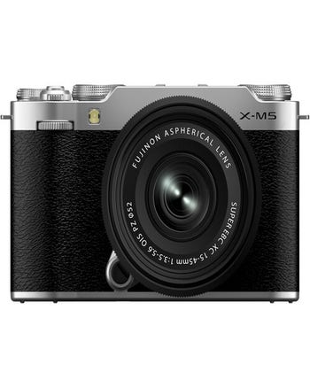 Front view of silver Fujifilm X-M5 mirrorless camera with XC 15-45mm lens attached