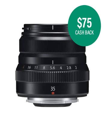 Fujifilm XF 35mm f/2 R WR black lens, front angled view showing aperture ring and glass element