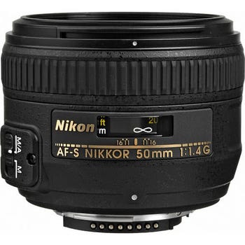 Front side view of Nikon AF-S NIKKOR 50mm f/1.4G prime lens showing focus scale and AF switch