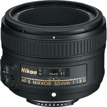 Nikon AF-S 50mm f/1.8G Nikkor prime lens, front view showing focus scale and gold branding