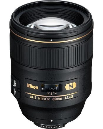 Nikon AF-S 85mm f/1.4G prime lens, front view showing focus scale and gold NIKKOR branding
