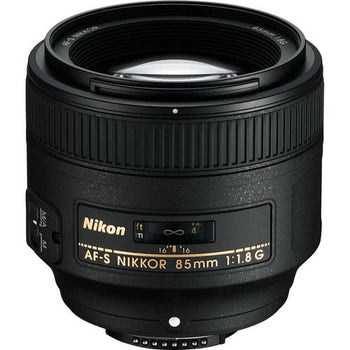Nikon AF-S NIKKOR 85mm f/1.8G FX-format prime lens, front view showing focus scale and controls