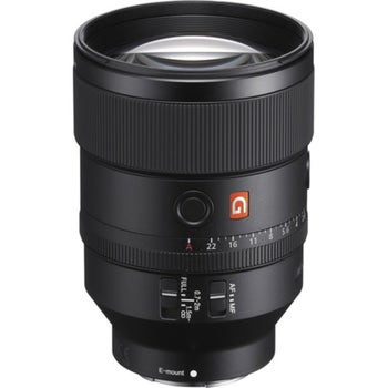 Angled product shot of Sony FE 135mm f/1.8 GM E-mount lens with aperture and focus switches