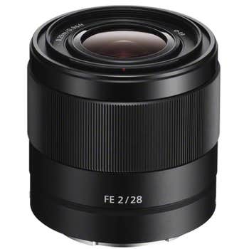 Sony FE 28mm f/2 full-frame E-mount prime lens, angled view showing compact black barrel and front element
