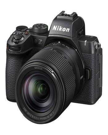 Nikon Z50 II mirrorless camera with attached DX 18-140mm f/3.5-5.6 VR zoom lens, front angled view