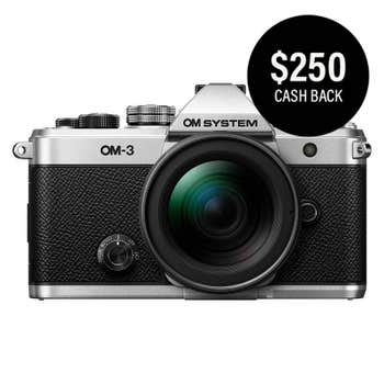 OM System OM-3 silver camera with 12-45mm lens, close front view, $250 cashback badge
