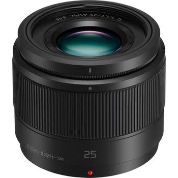 Panasonic Lumix G 25mm f/1.7 ASPH black prime lens with ribbed focus ring, front angled view