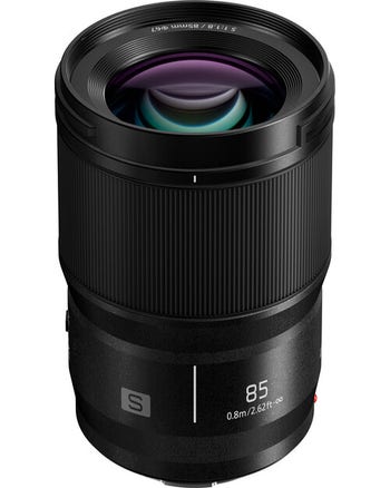 Front view of Panasonic Lumix S 85mm f/1.8 L-Mount lens showing large glass element and 85mm marking