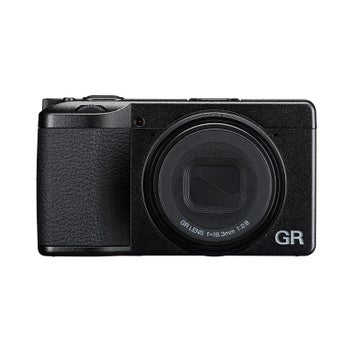 Front view of Ricoh GR IV compact camera with 18.3mm f/2.8 GR lens retracted