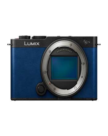 Front view of Panasonic LUMIX S9 compact full-frame mirrorless camera body in night blue, no lens attached