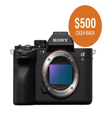 Sony A7R V mirrorless camera body front view with $500 cashback promo badge