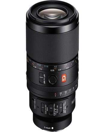 Sony FE 100mm f/2.8 Macro GM OSS E-mount lens showing focus, aperture and stabilisation controls