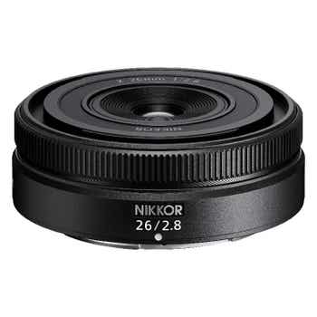 Nikon Nikkor Z 26mm f/2.8 ultra-slim prime lens, front angled view showing compact pancake design.