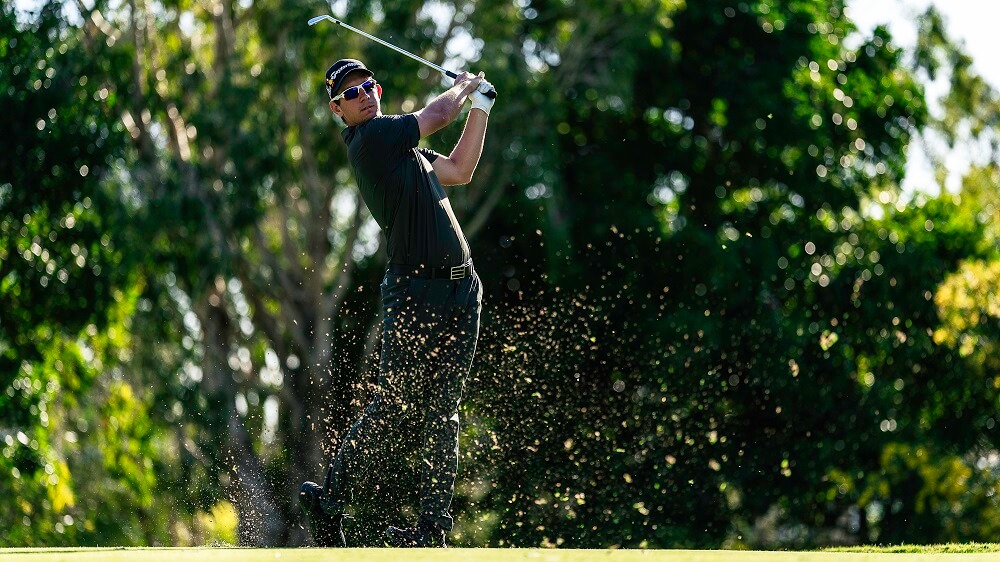 Golf photography shot of a male golfer, taken by Kurt Thomson.